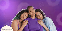 Three friends showing support for each other with a comforting embrace