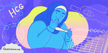 A woman wearing a hijab is holding a positive pregnancy test while covering her mouth in surprise. 
