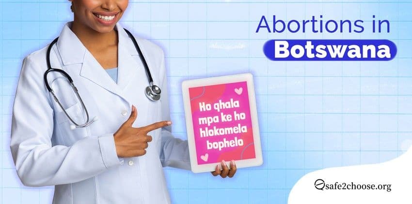 A female doctor holding a tablet to talk about the of the abortions in Botswana