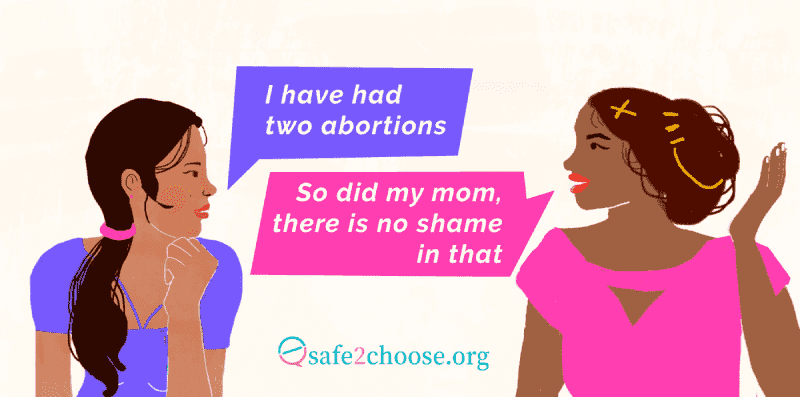Two women chatting about abortion experiences